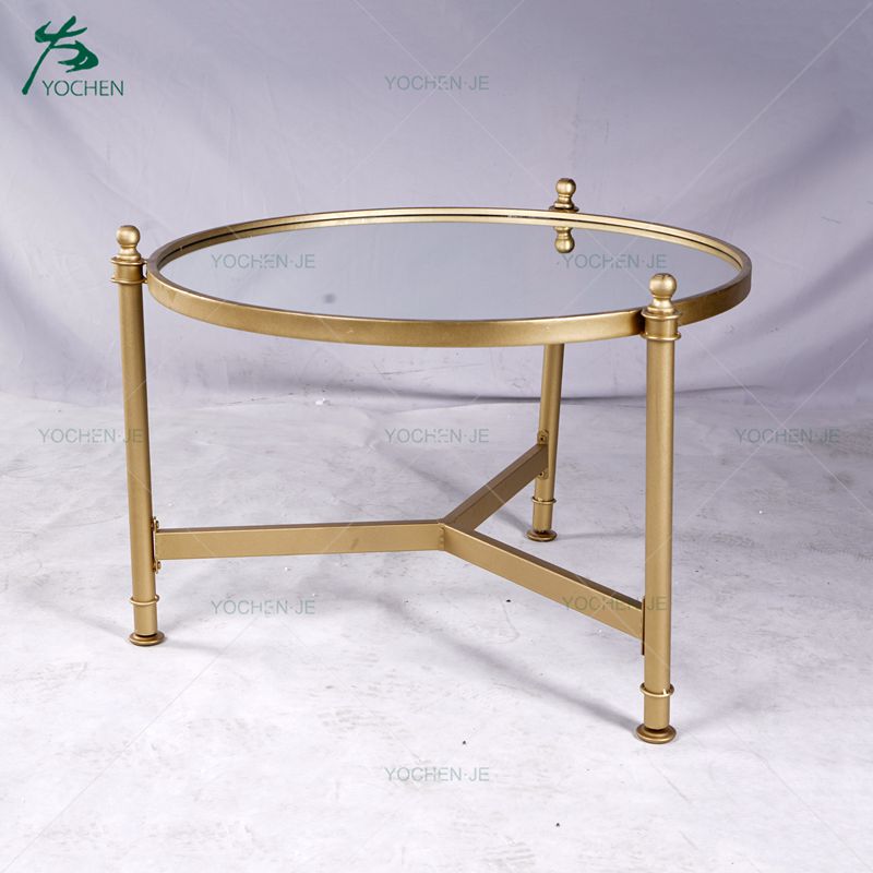 Wrought iron coffee table with round glass top
